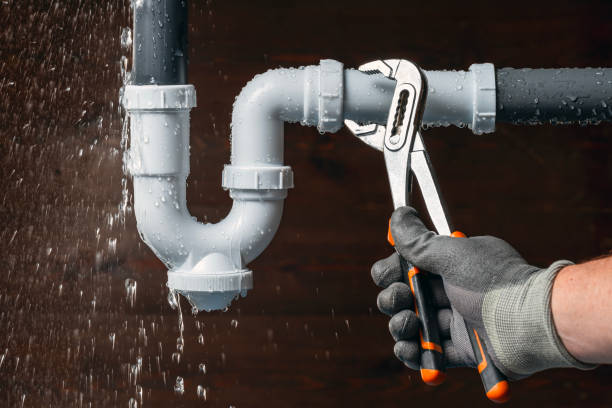 Professional Emergency Plumber technician working in Beltsville, MD